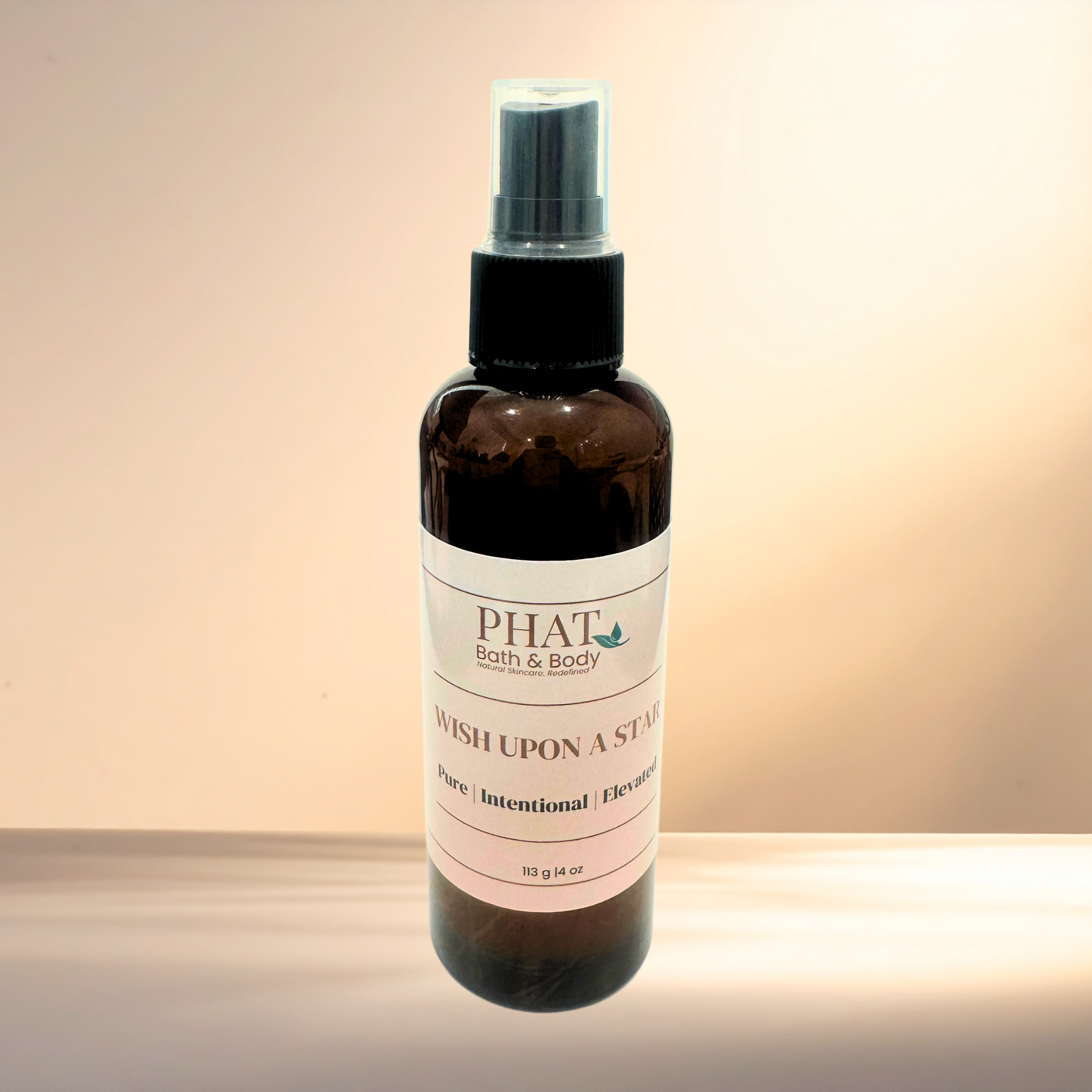 Brown spray bottle with a label on a gradient background