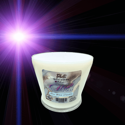 Candle with a label on a dark background with light effects