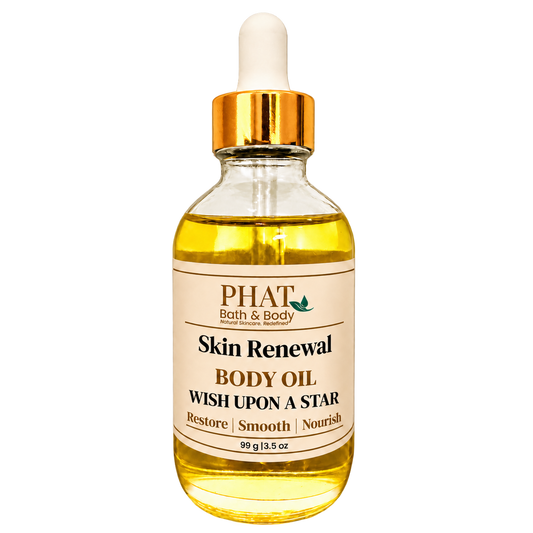 Phat Bath & Body Wish Upon a Star Skin Renewal Body Oil in a clear glass dropper bottle with a cream label and rich golden oil.
