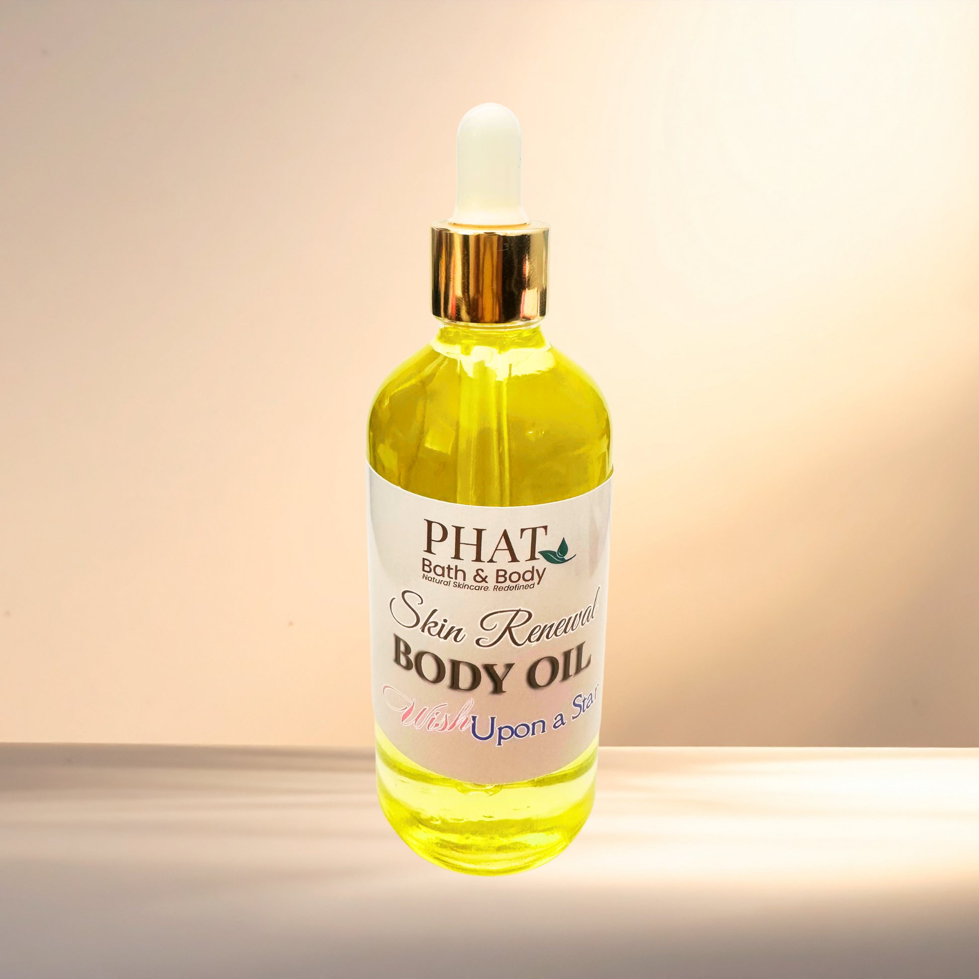 Bottle of PHAT Bath & Body body oil on a gradient background