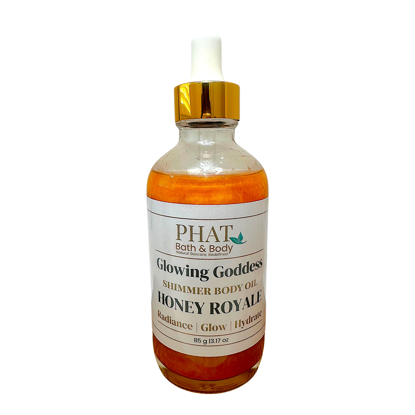 Phat Bath & Body Honey Royale shimmering body oil in a glass bottle with a gold cap for radiant hydrated skin