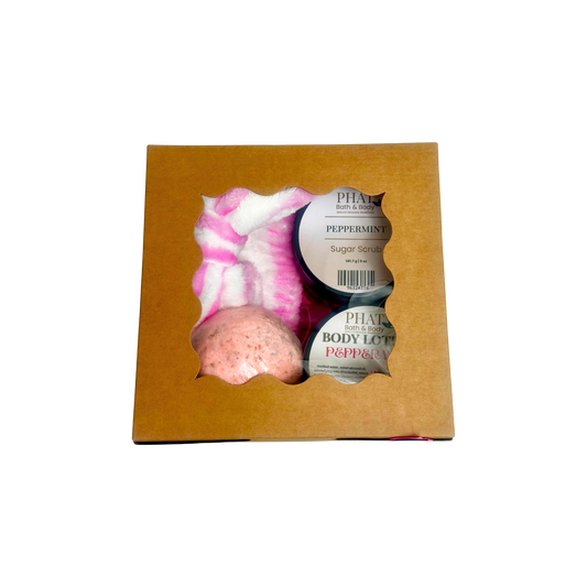 Phat Bath & Body Peppermint Holiday Bundle Gift Box with body lotion, sugar scrub, bath bomb and skincare headband for a refreshing self-care gift.