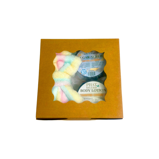 Toasted Coconut Holiday Bundle Gift Box by Phat Bath & Body featuring body lotion, sugar scrub and a skincare headband for a sweet coconut-inspired self-care gift.